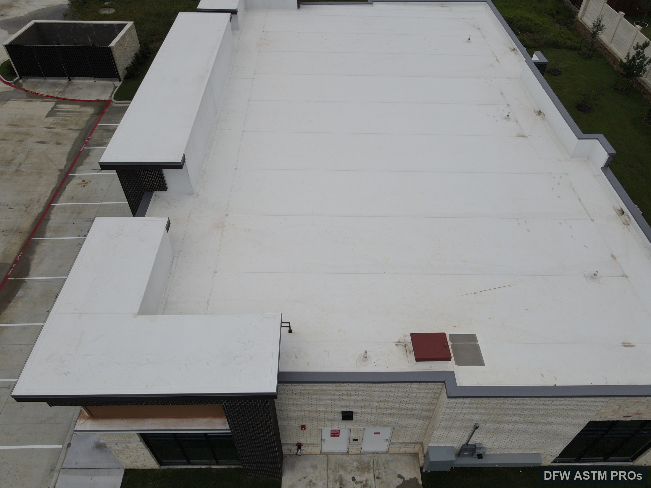 Visible aerial overview of the white TPO roof