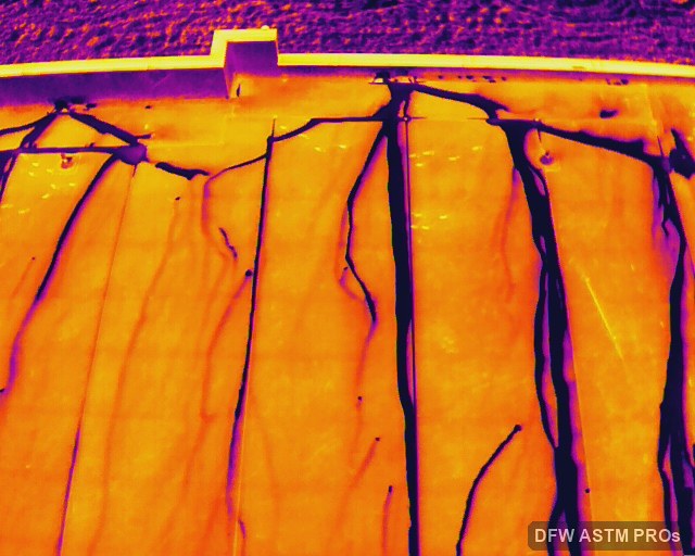 Oblique thermogram of a new TPO roof showing dark branching patterns